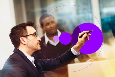 Man pointing at whiteboard
