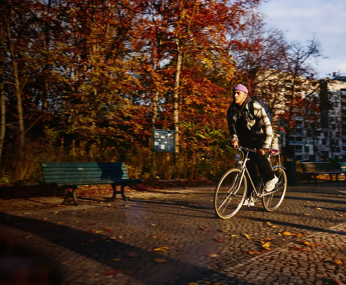 Person riding bicycle in park